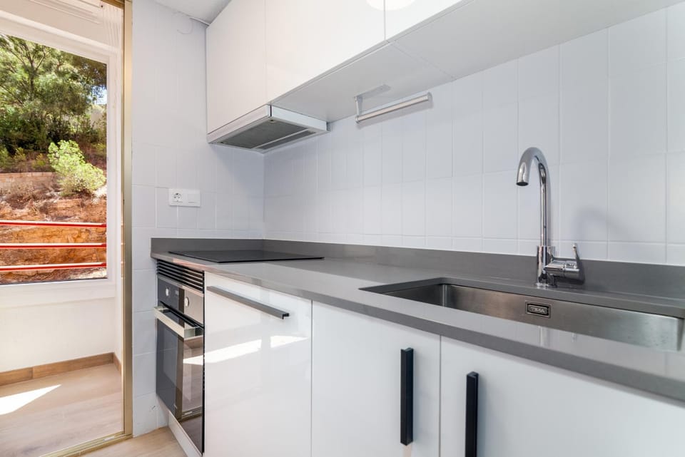 Kitchen or kitchenette, stove