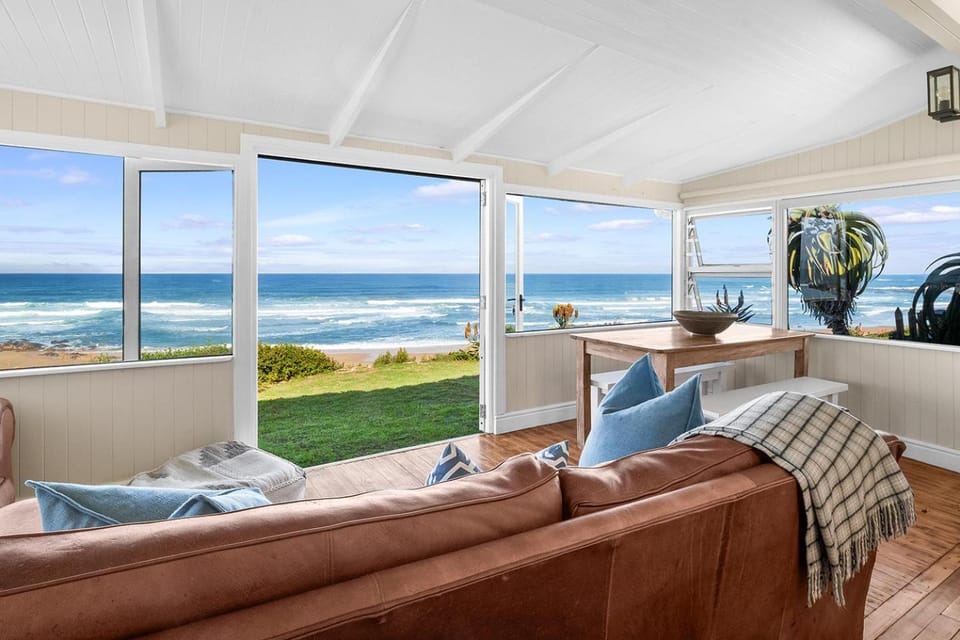Natural landscape, View (from property/room), Living room, Seating area, Sea view