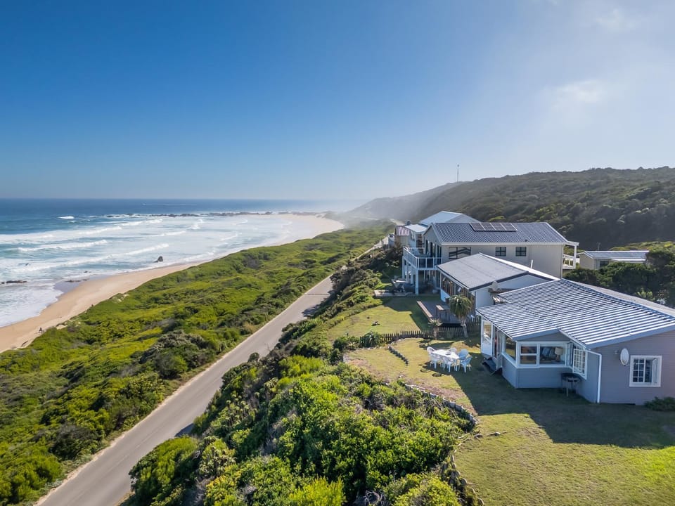 Property building, Day, Natural landscape, Beach, Sea view