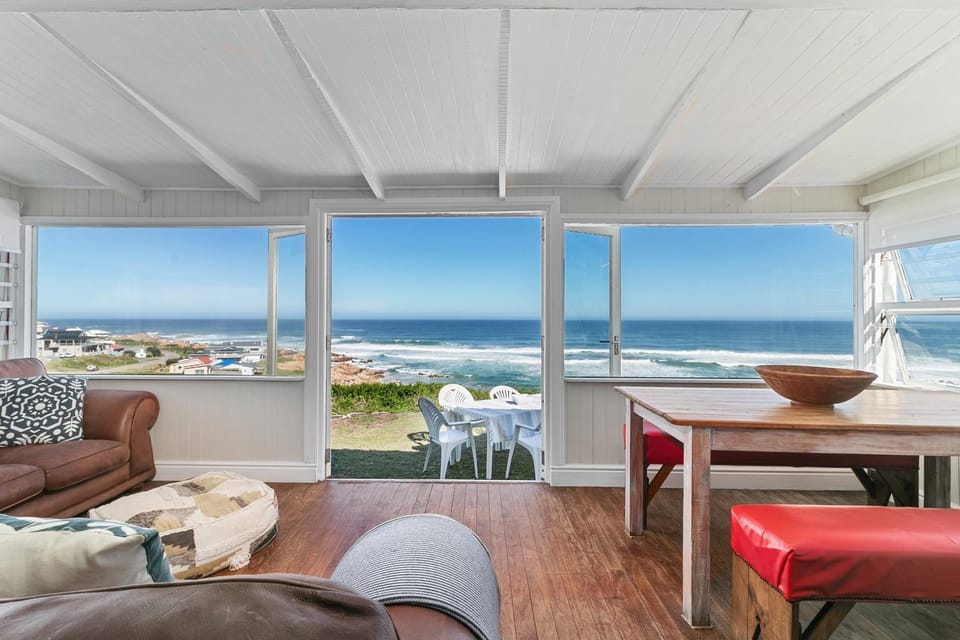 Natural landscape, Living room, Seating area, Dining area, Beach, Sea view