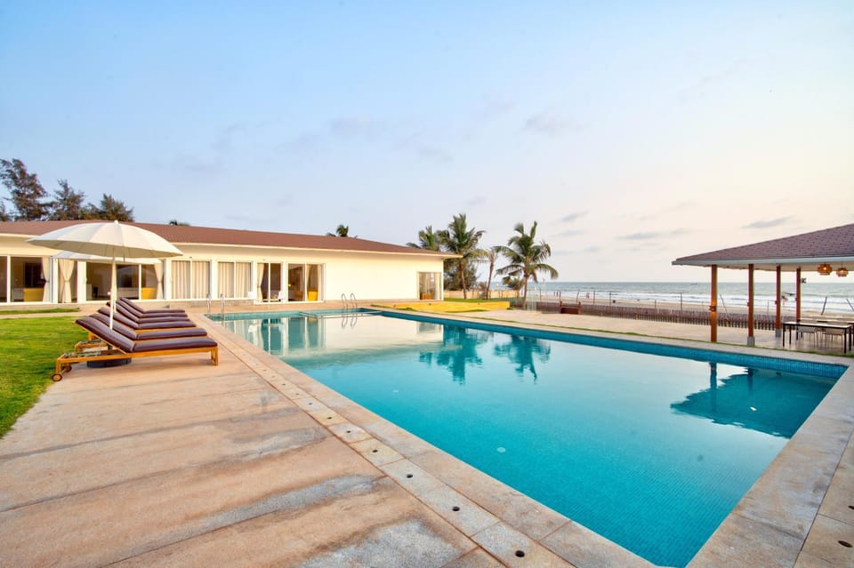 Property building, Day, Natural landscape, Pool view, Swimming pool, sunbed