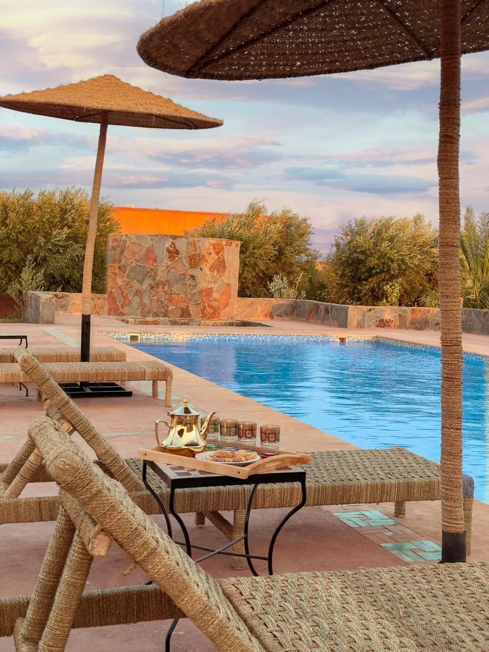 Patio, Day, Natural landscape, Pool view, Swimming pool, sunbed