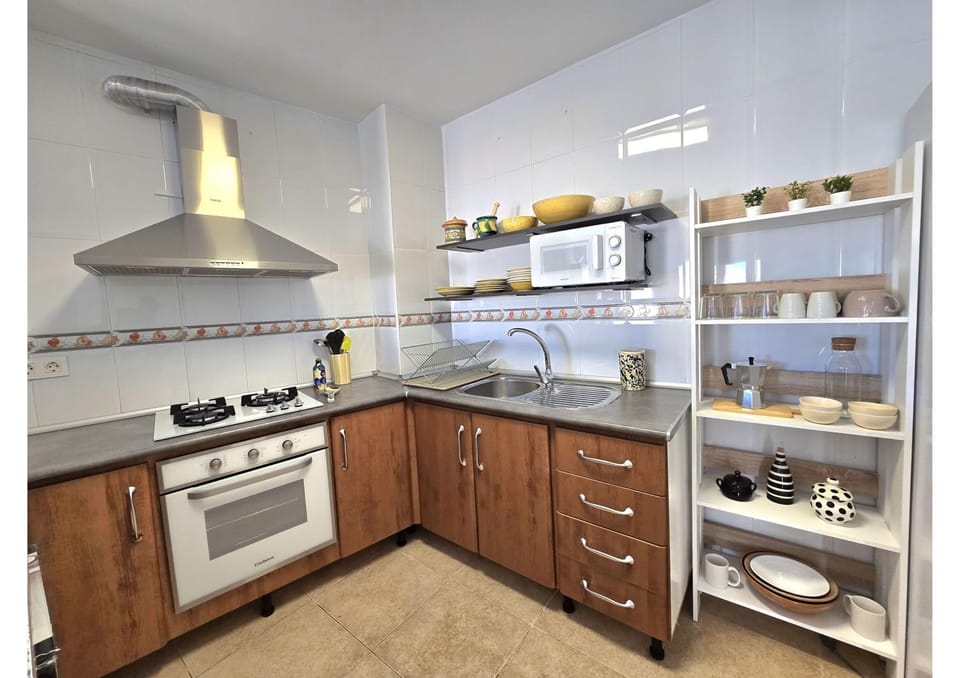 Kitchen or kitchenette, oven, stove, toaster