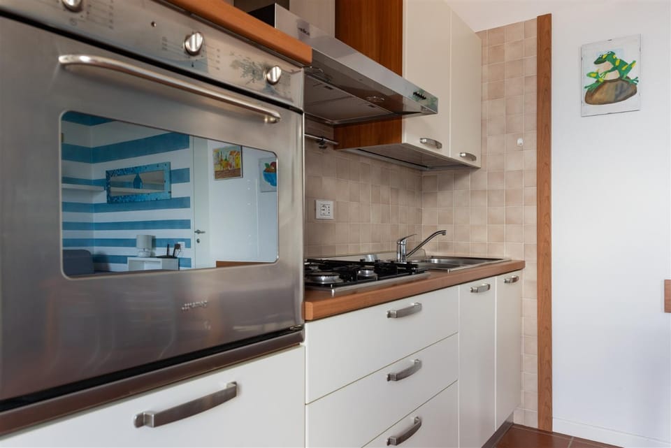 Kitchen or kitchenette, stove