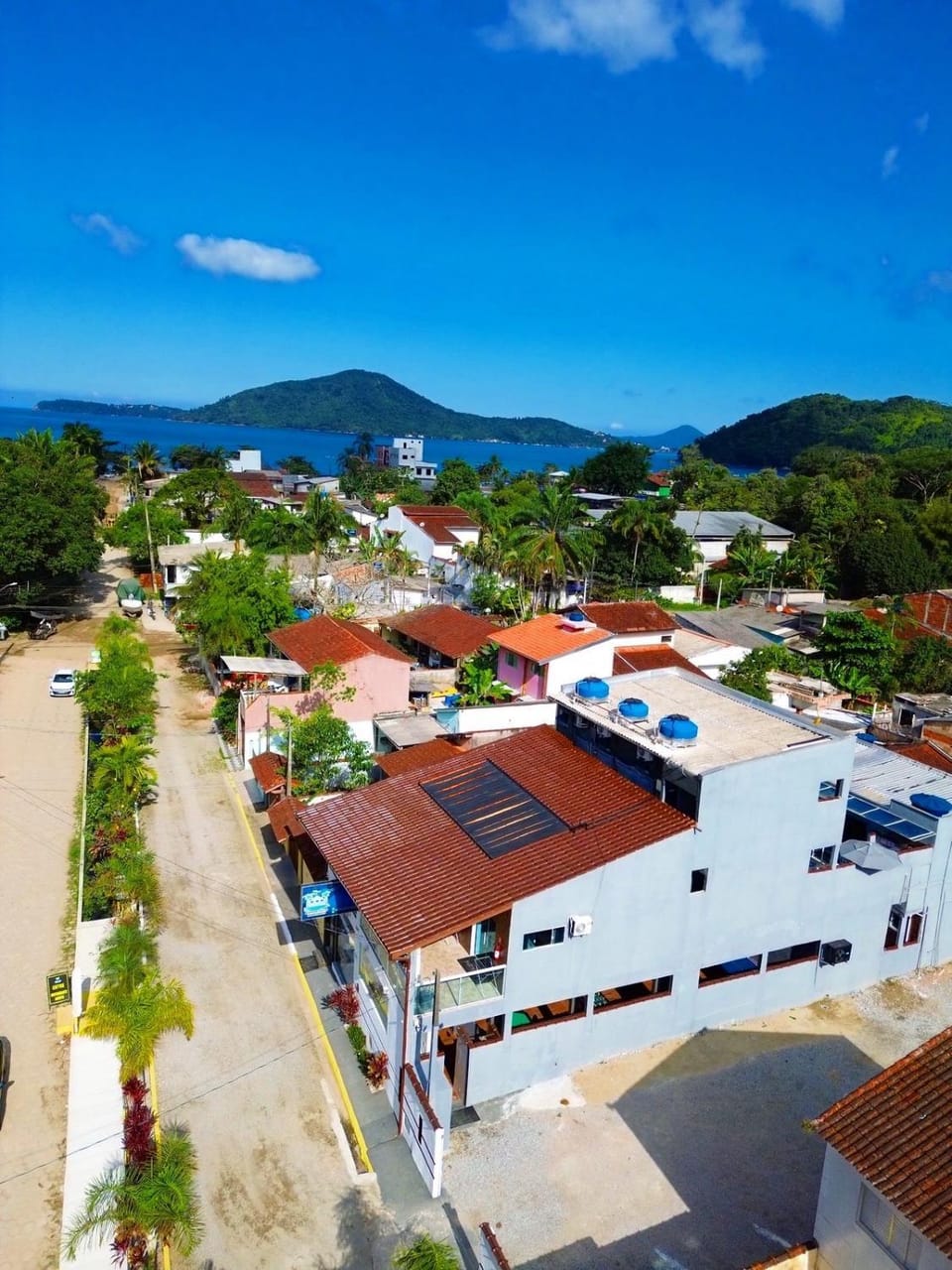 Property building, Facade/entrance, Day, Neighbourhood, Natural landscape, Bird's eye view, Beach, City view, Mountain view, Sea view, Street view, Location, Parking