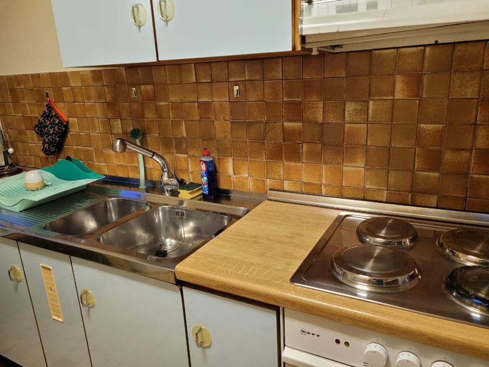 Kitchen or kitchenette, stove