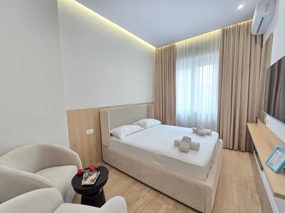 Bed, TV and multimedia, Photo of the whole room, Seating area, towels