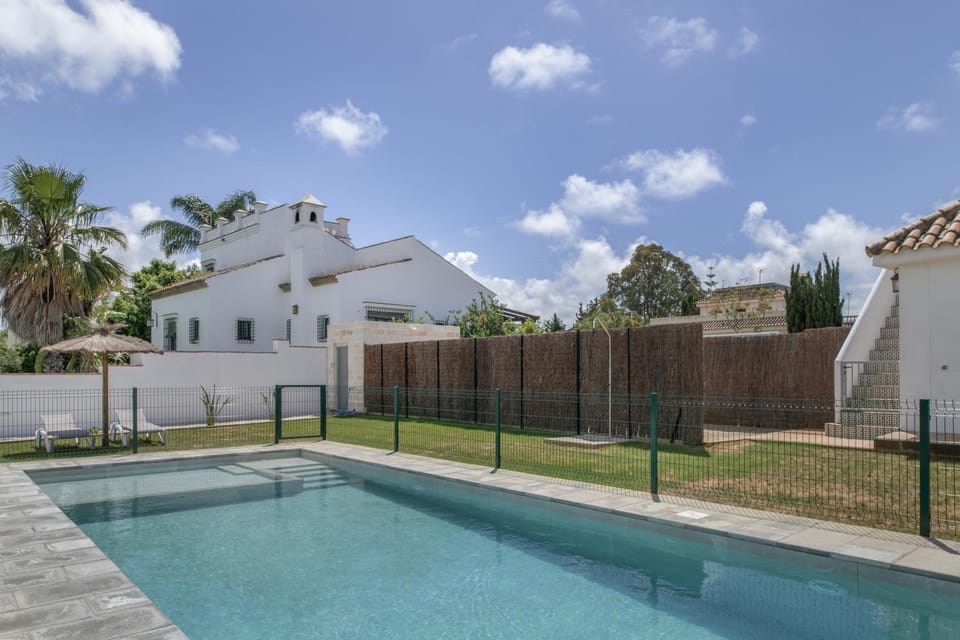 Property building, Living room, Swimming pool