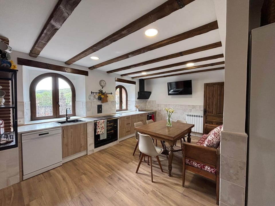 Kitchen or kitchenette, dishwasher, oven, stove