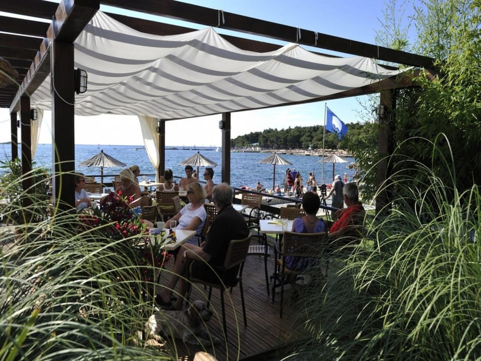 Patio, Restaurant/places to eat, Facade/entrance, Food close-up, Children play ground, Lounge or bar, Food and drinks, Other, Other, Decorative detail, Beach, Kids's club, Evening entertainment, On site, Food, Sea view, Area and facilities, Entertainment, Drinks, Alcoholic drinks, Non alcoholic drinks