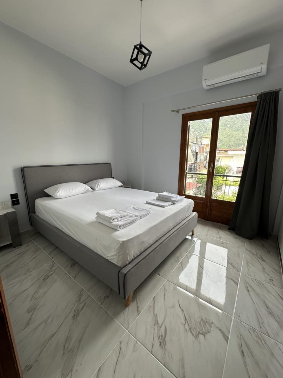 Bed, Photo of the whole room, Bedroom, towels, air conditioner