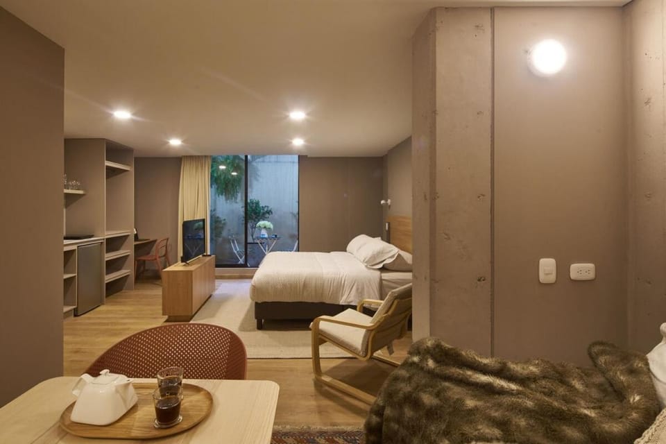 Bed, Living room, Photo of the whole room, Seating area, Bedroom, wardrobe