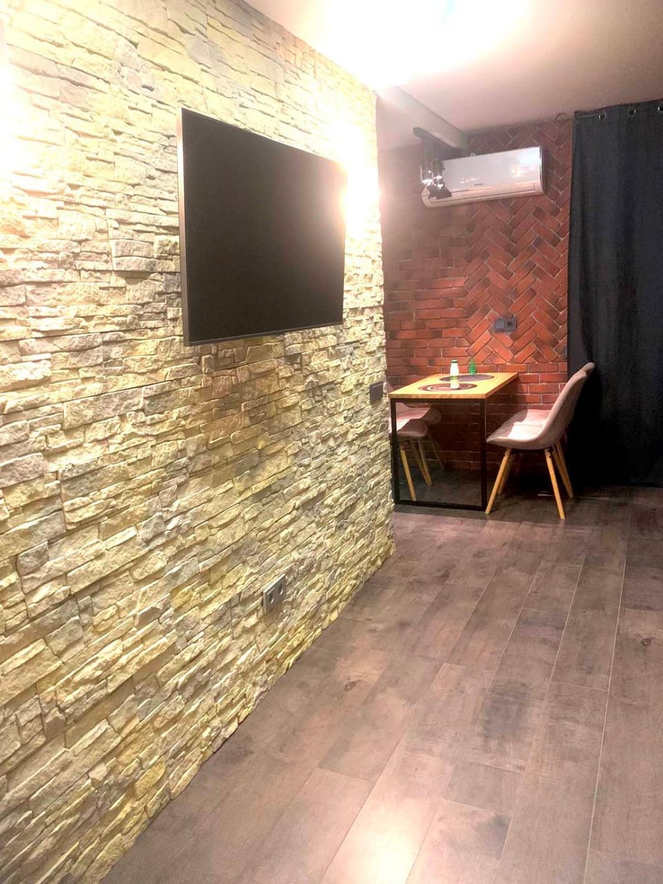Stone city center Apartment in Ukraine