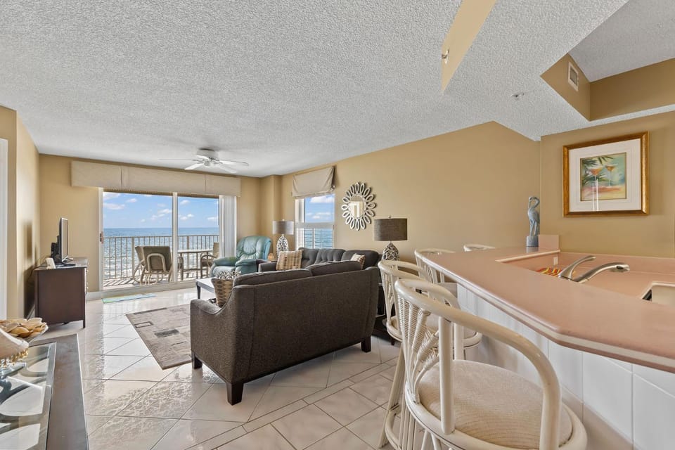 TV and multimedia, View (from property/room), Living room, Seating area, Dining area, Beach, Sea view