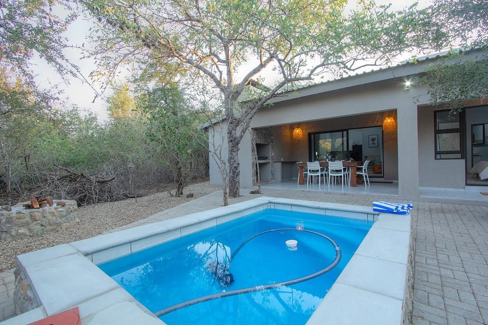 Property building, Patio, Natural landscape, Garden, Garden view, Pool view, Swimming pool, towels
