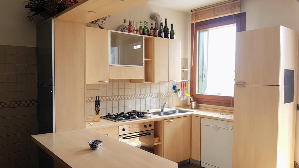 Kitchen or kitchenette, stove