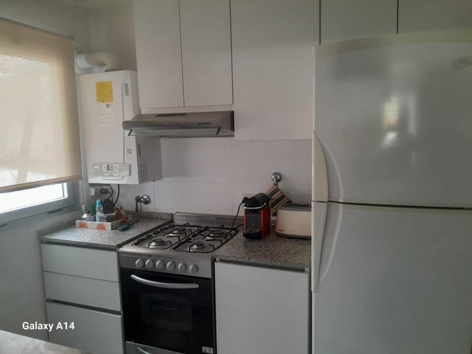 Kitchen or kitchenette, oven, toaster
