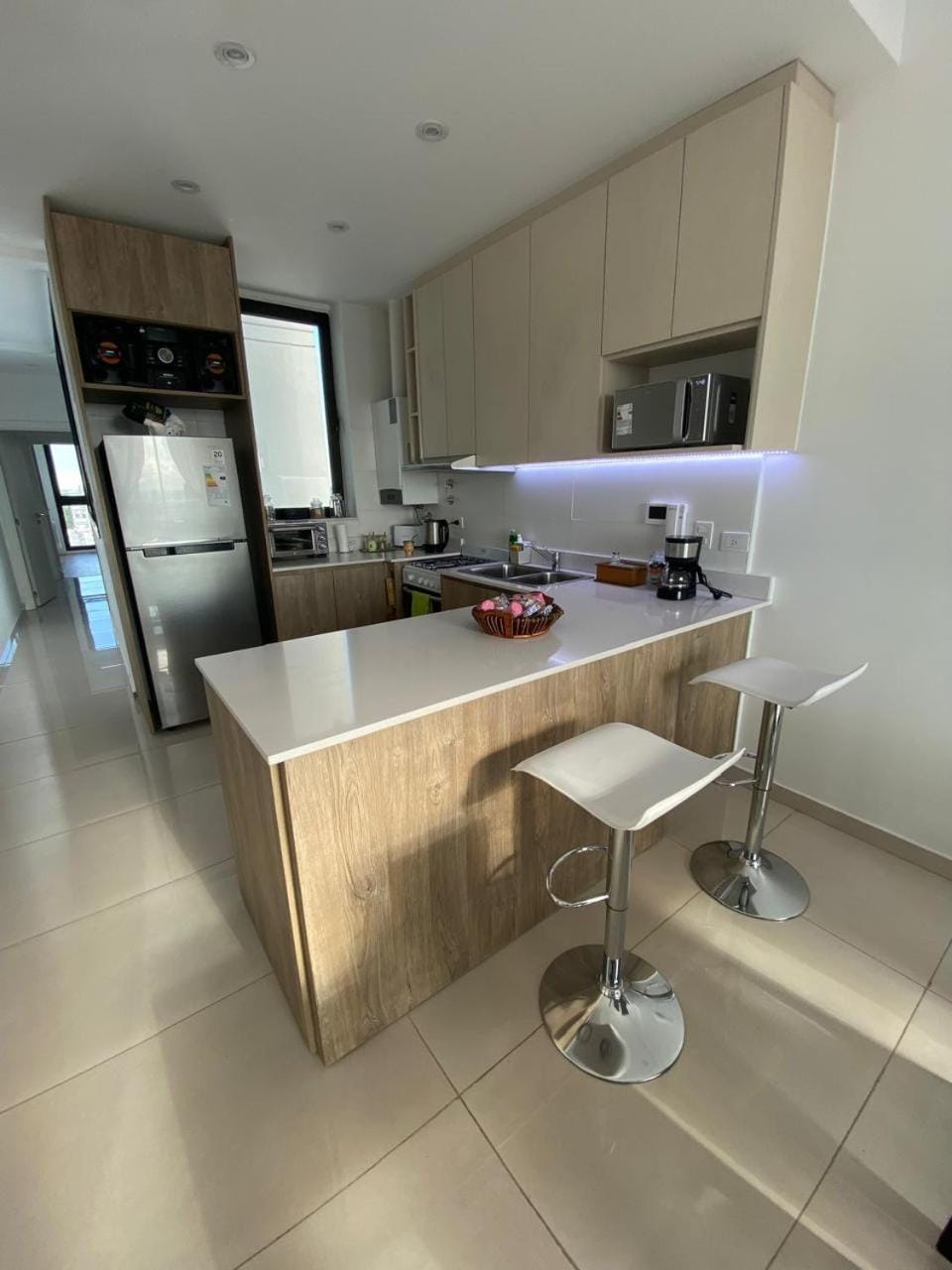 Kitchen or kitchenette, dishwasher, oven, stove