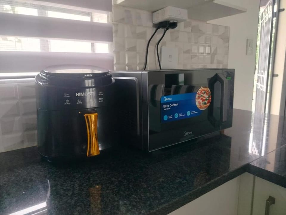Kitchen or kitchenette, microwave