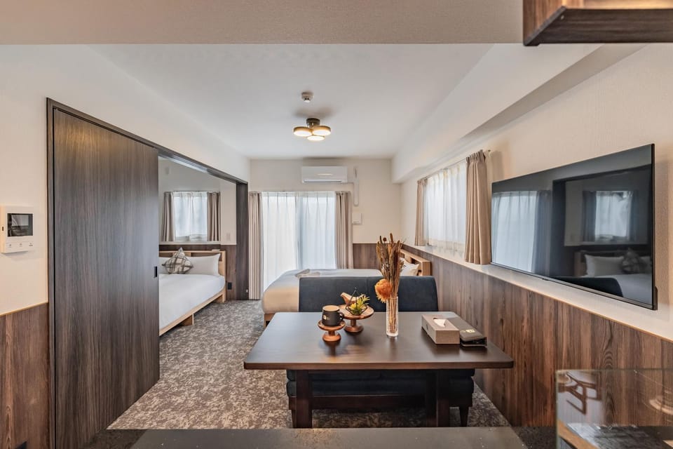 Bed, TV and multimedia, Kitchen or kitchenette, Living room, Photo of the whole room, Seating area, Bedroom