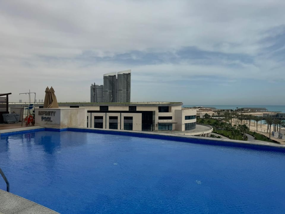 الحي اللاتيني العلمين الجديده علي اللاجون والابراج Latini Apartment in Egypt