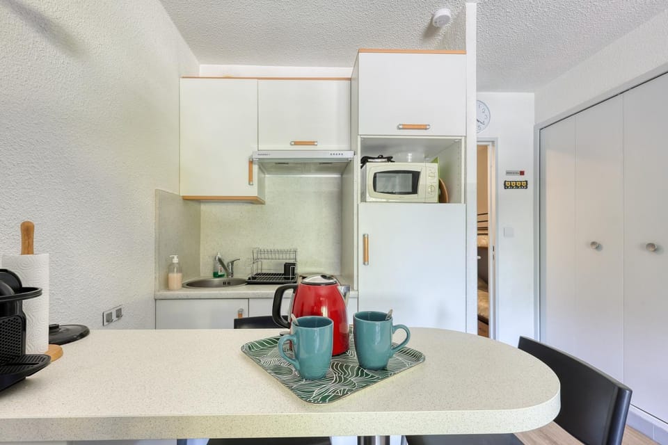 Kitchen or kitchenette, stove