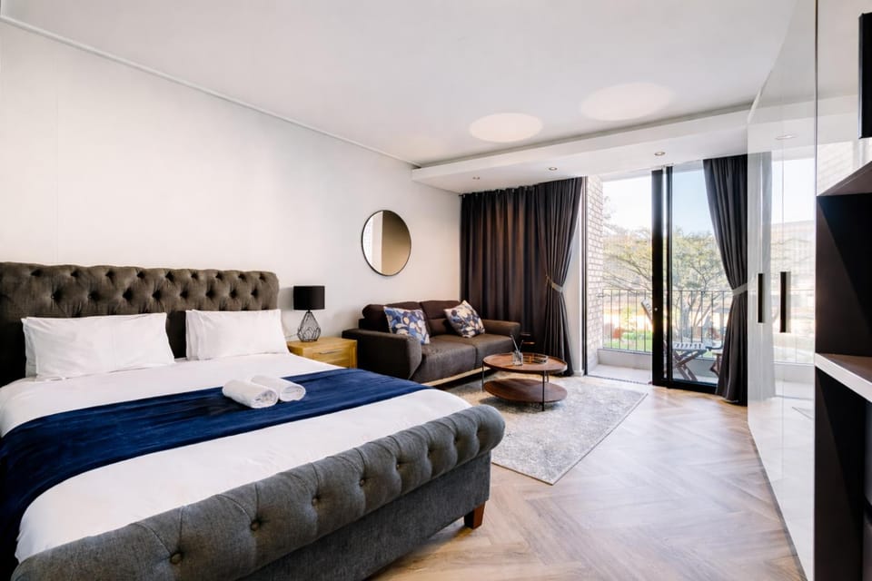 Bed, Living room, Seating area, Bedroom