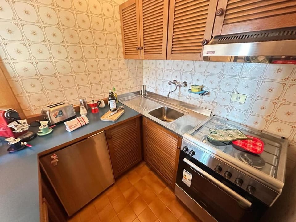 Kitchen or kitchenette, stove, toaster