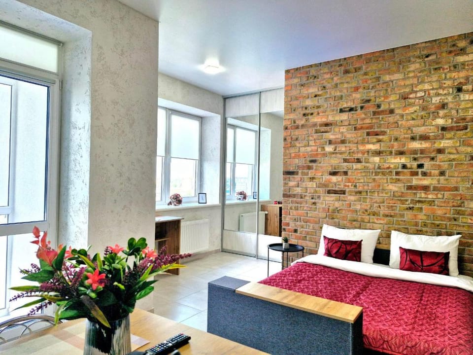Bed, Living room, Seating area, Bedroom