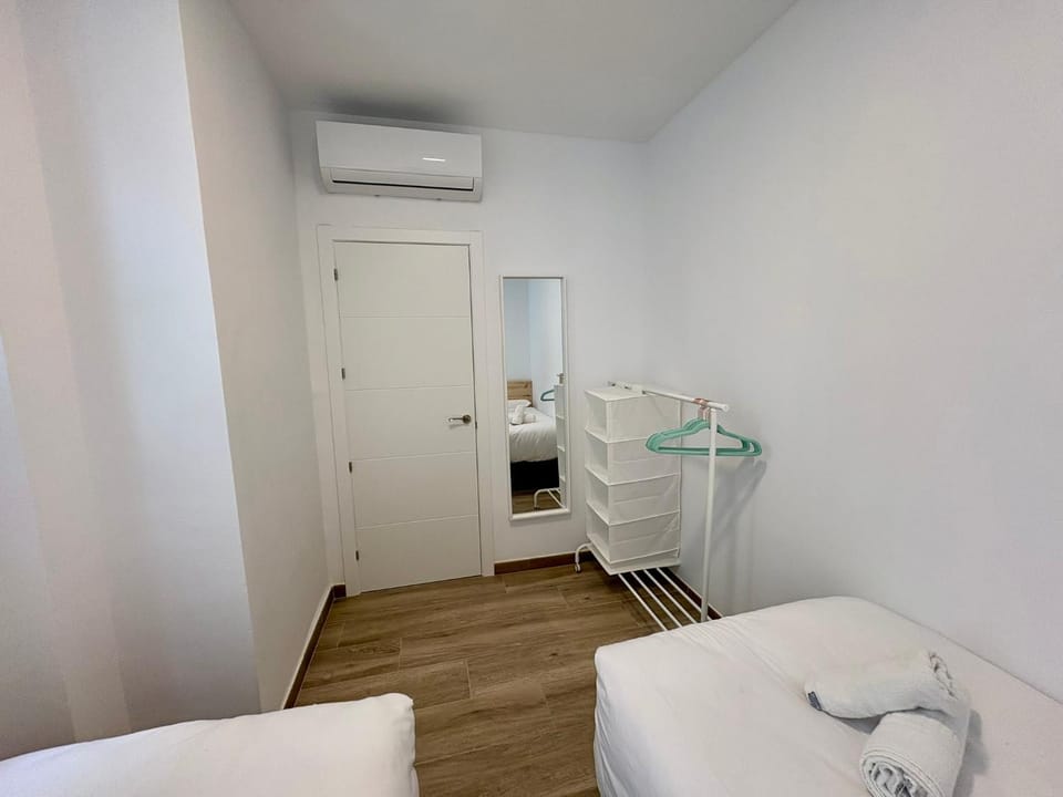 Bed, Photo of the whole room, Bedroom, towels, air conditioner