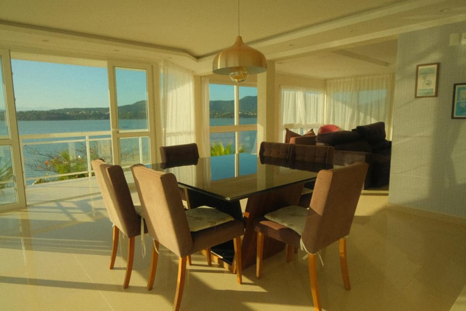 Natural landscape, Living room, Seating area, Dining area, Lake view