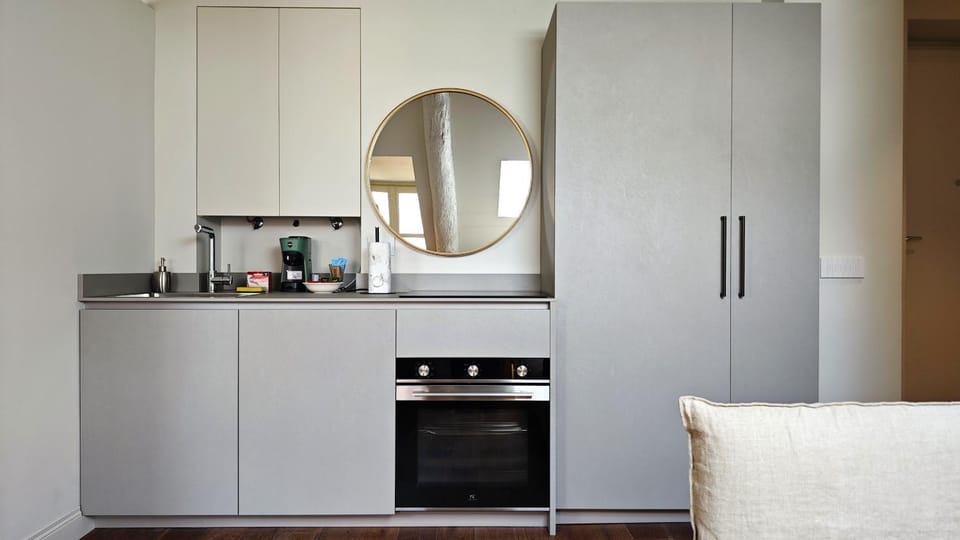 Kitchen or kitchenette, oven, stove, wardrobe