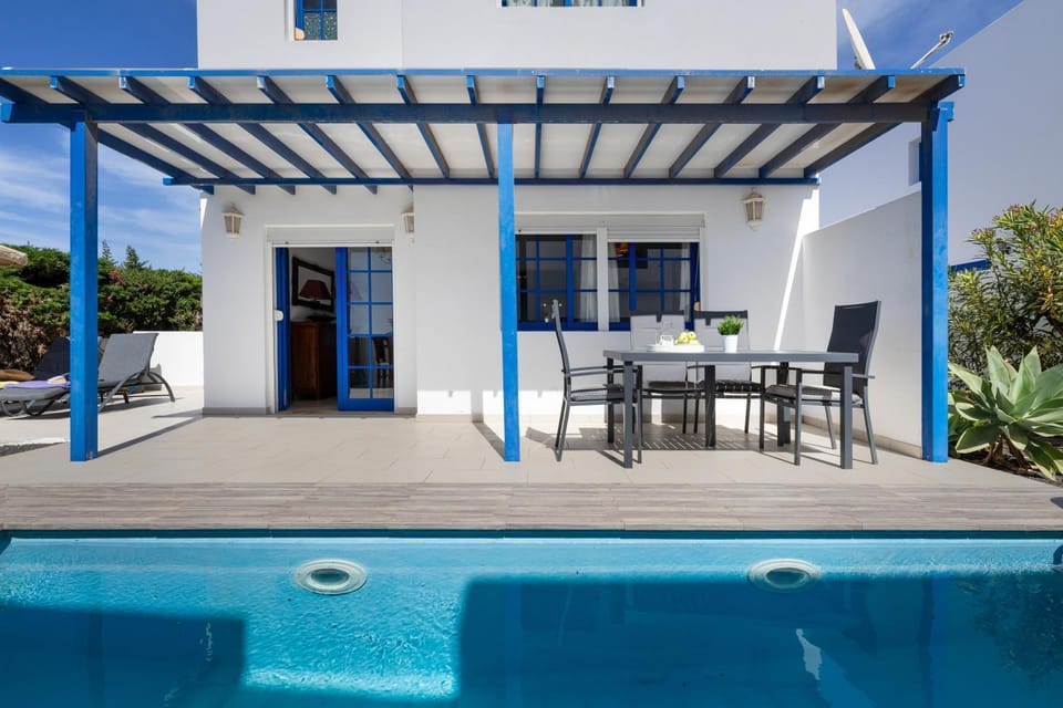 Property building, Living room, Swimming pool