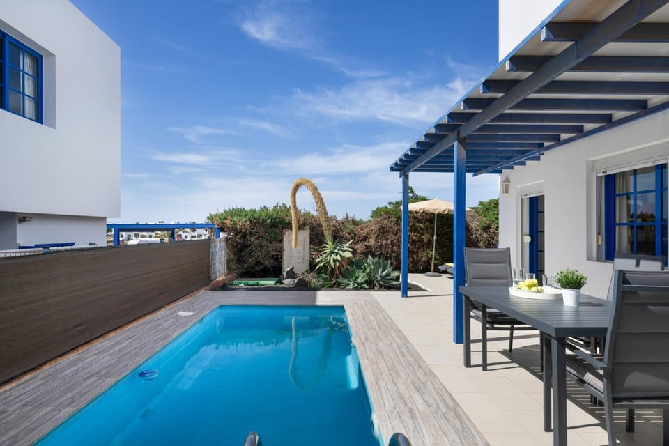 Property building, Living room, Swimming pool