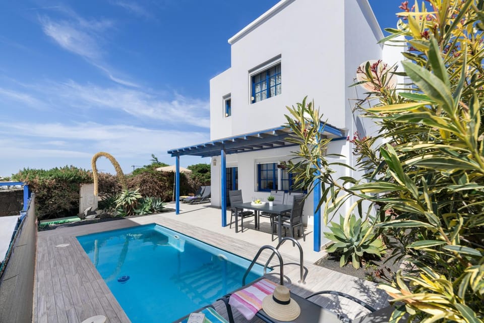 Property building, Living room, Swimming pool