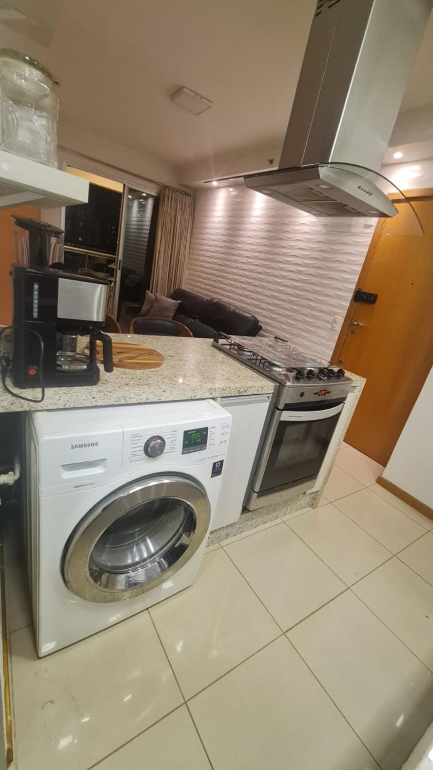 Kitchen or kitchenette, stove, washing machine