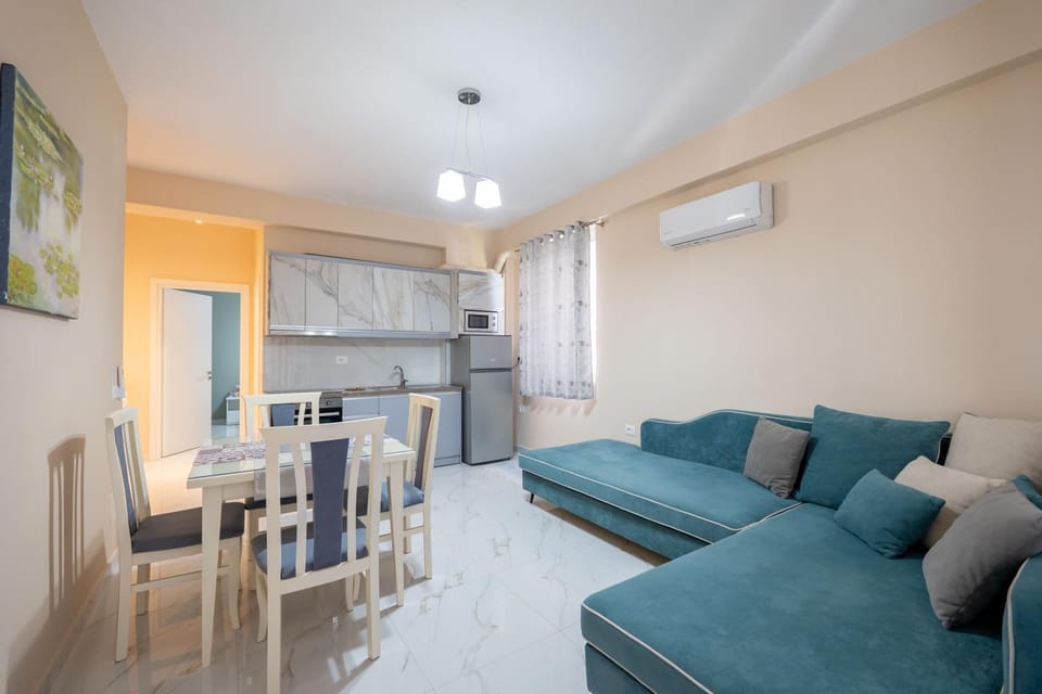 Kitchen or kitchenette, Living room, Seating area, Dining area, air conditioner