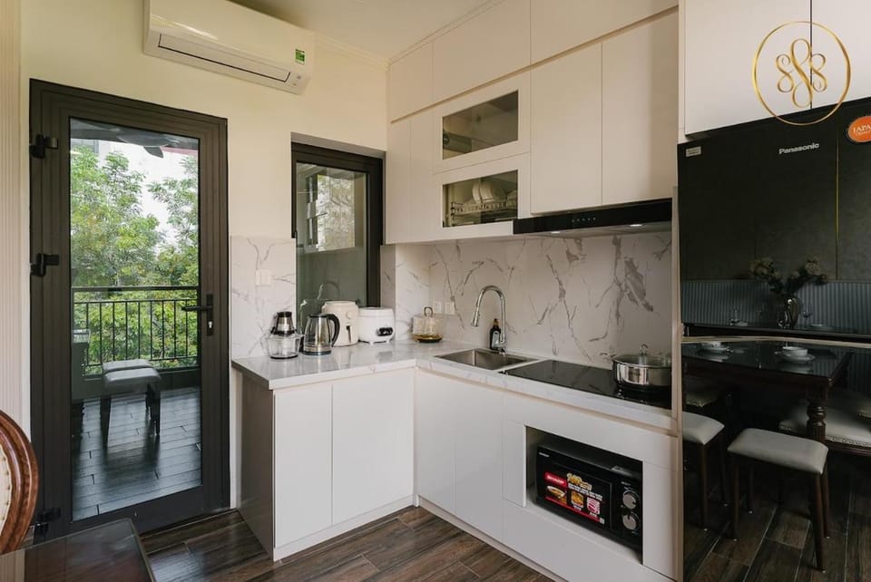 Kitchen or kitchenette, dishwasher, oven, stove