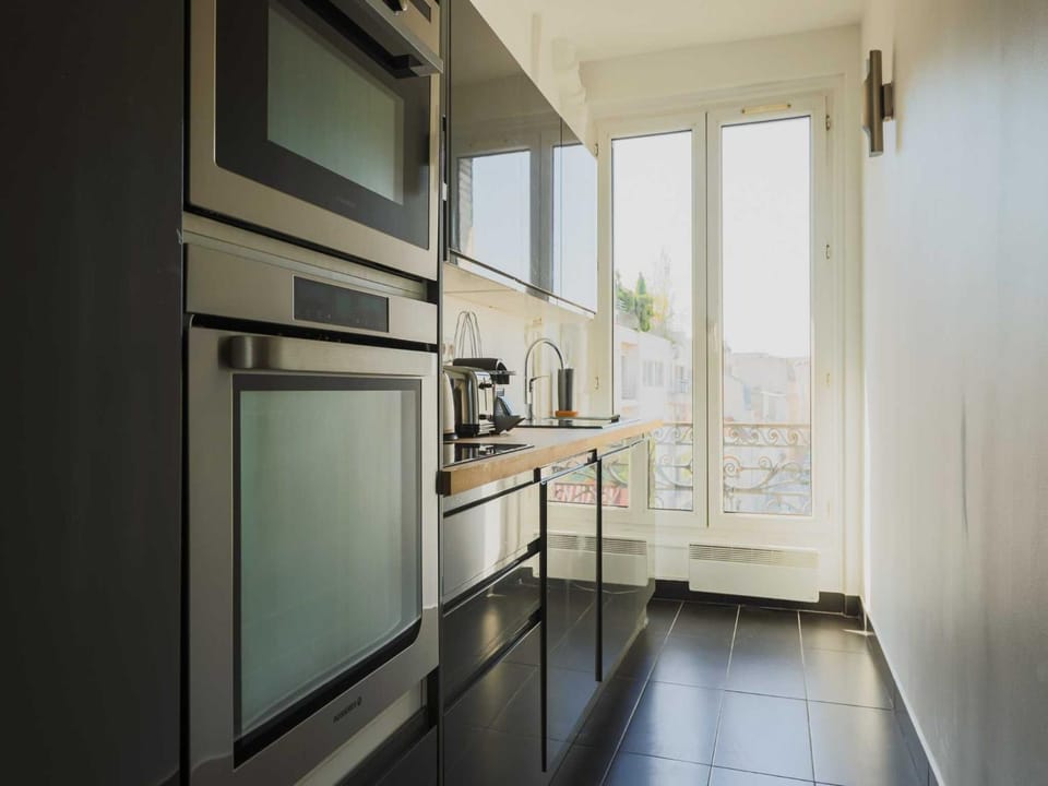 Kitchen or kitchenette, stove, toaster