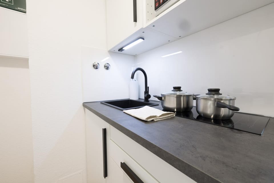 Kitchen or kitchenette, stove, kitchen