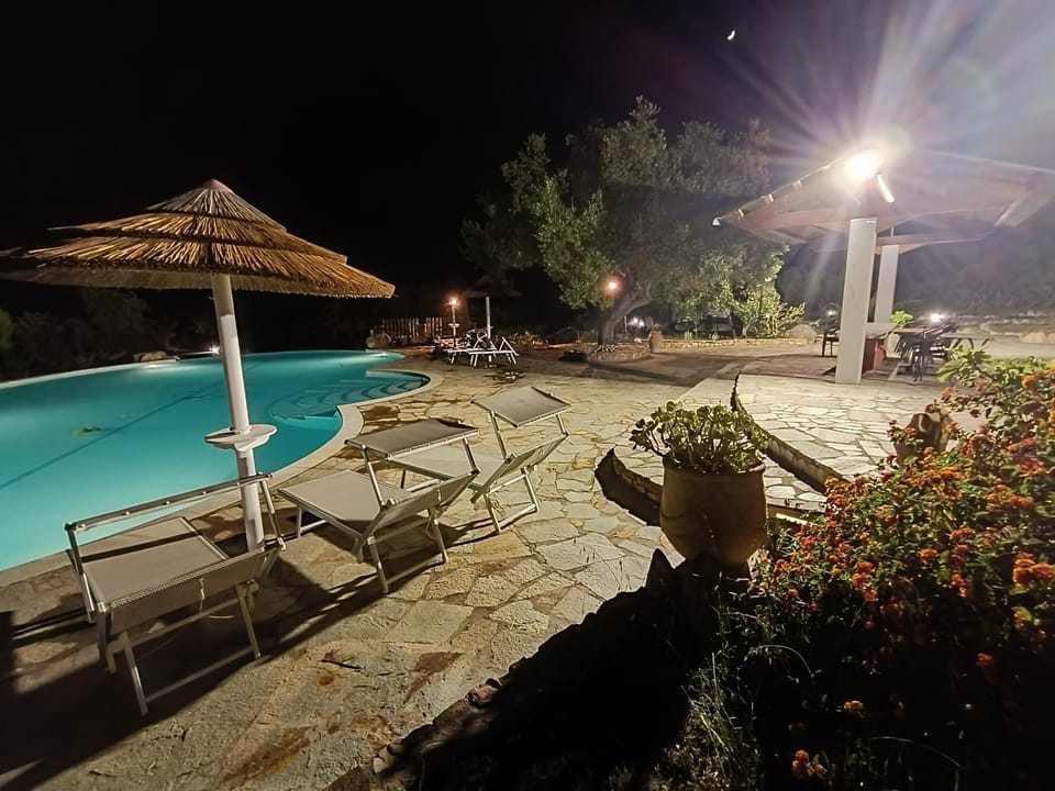 Property building, Living room, Swimming pool