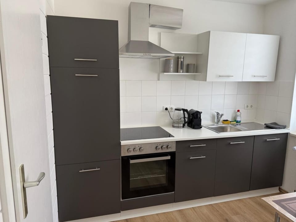 Kitchen or kitchenette, oven, stove