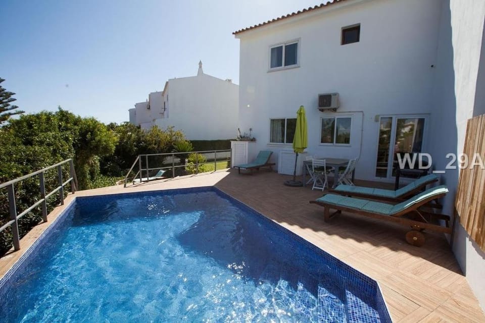 Property building, Day, Pool view, Swimming pool