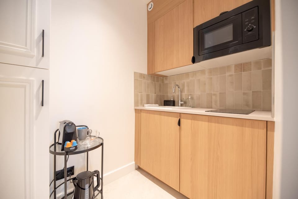 Kitchen or kitchenette, stove