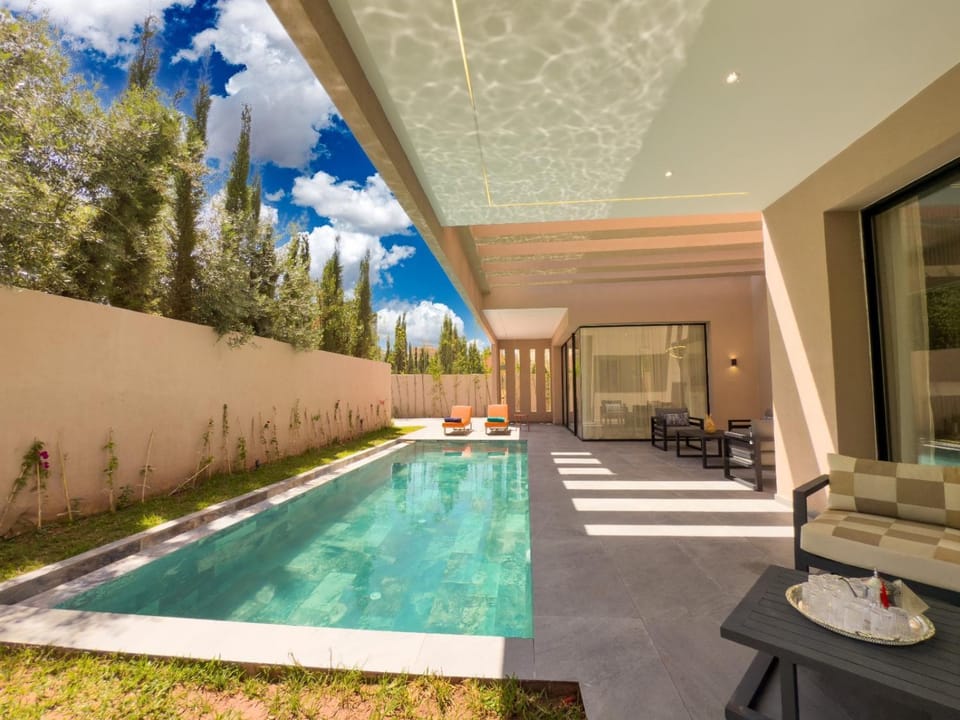 Patio, Day, View (from property/room), Garden view, Pool view, Swimming pool, sunbed