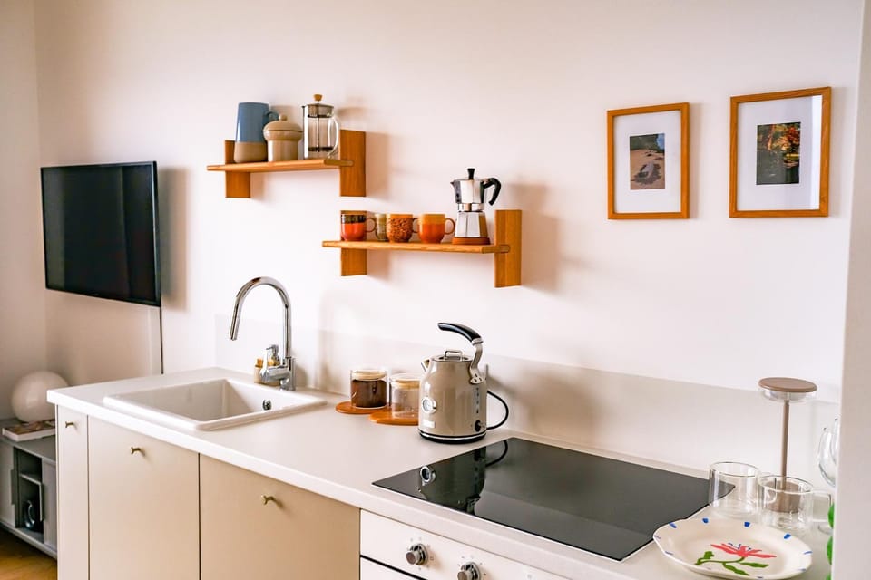 Kitchen or kitchenette, oven, stove