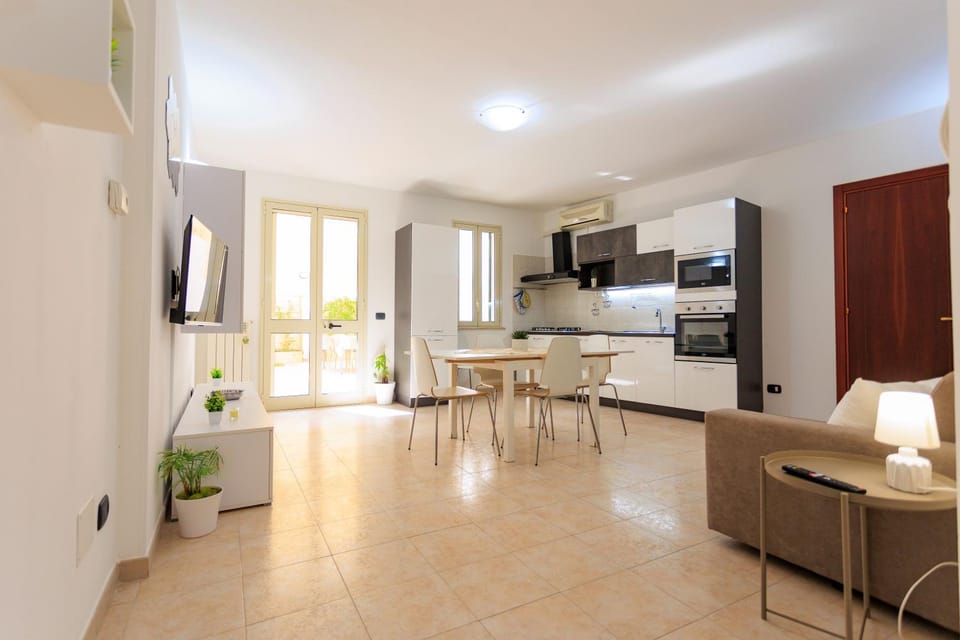 TV and multimedia, Kitchen or kitchenette, Living room, Seating area, Dining area, oven, stove