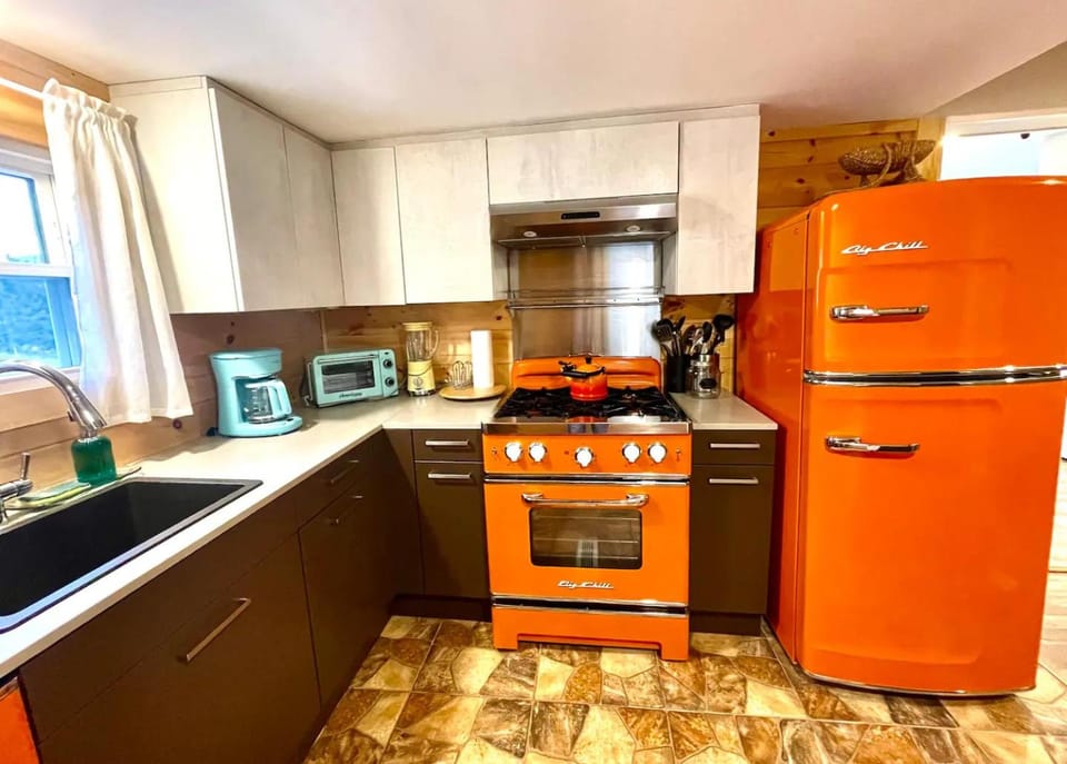 Kitchen or kitchenette, dishwasher, oven, stove, toaster