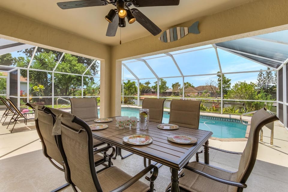 Heated Pool with Freshwater Canal View - Tropical Oasis - Roelens House in Cape Coral