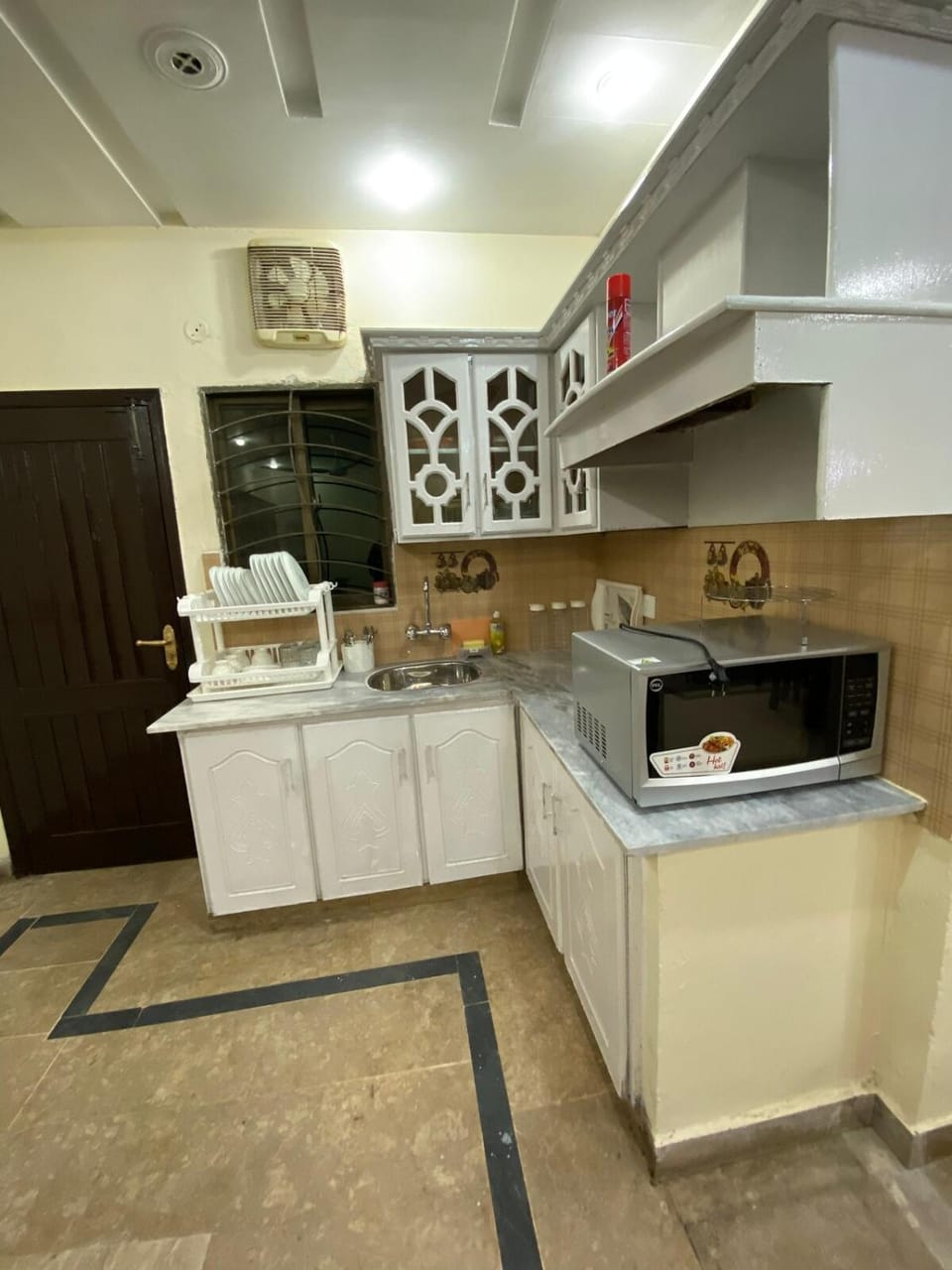 Kitchen or kitchenette, oven, stove